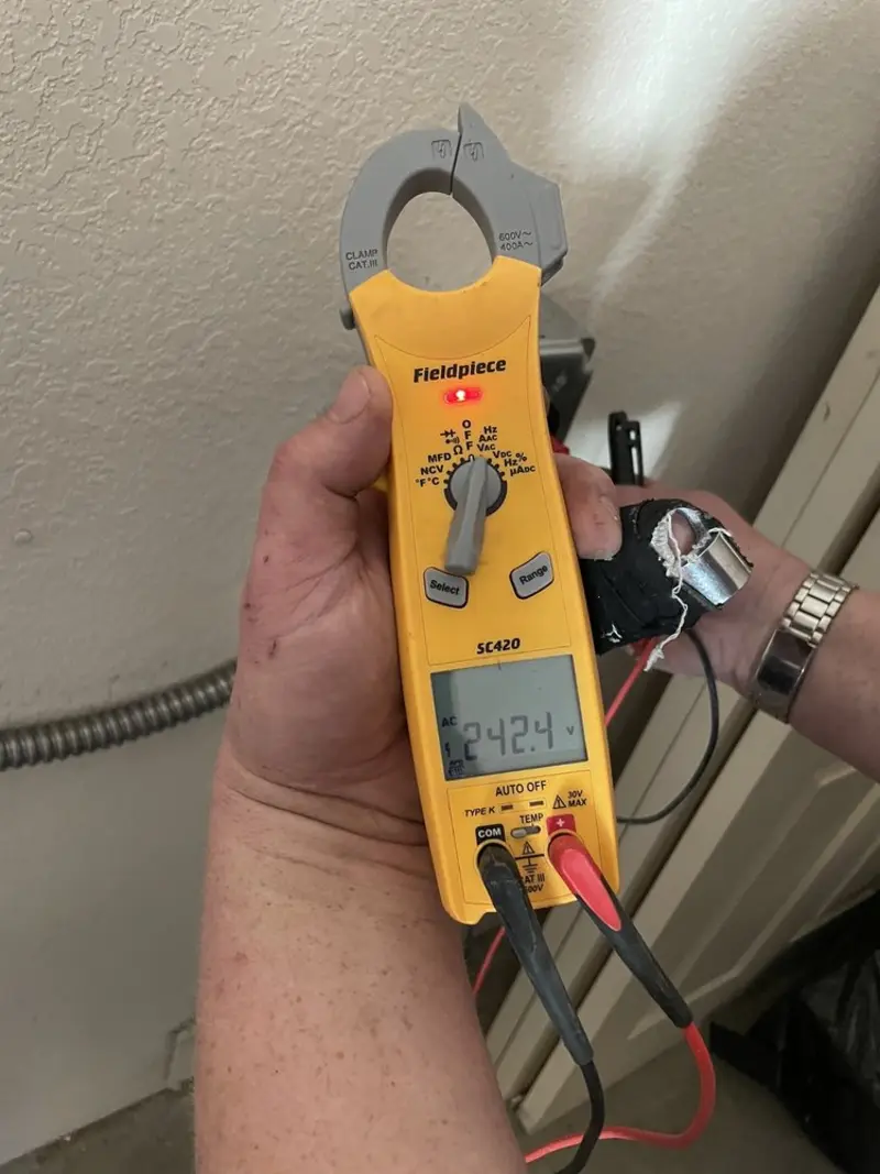 Voltage testing with clamp meter during Aluminum Wiring Replacement in Beaver Dam